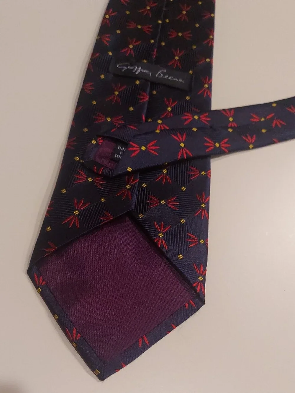 Vintage Geoffrey Beene Silk Navy Tie with Red Floral Pattern and Yellow Accents